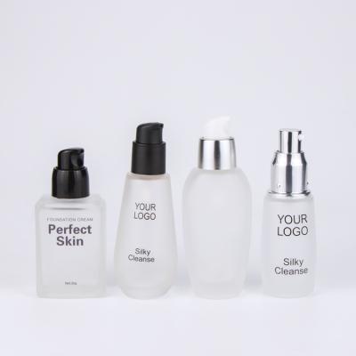 China Custom Empty Cosmetic Lotion Bottles Pump Up Personal Care Makeup Container Packaging Base Luxury Square Glass Bottle for sale