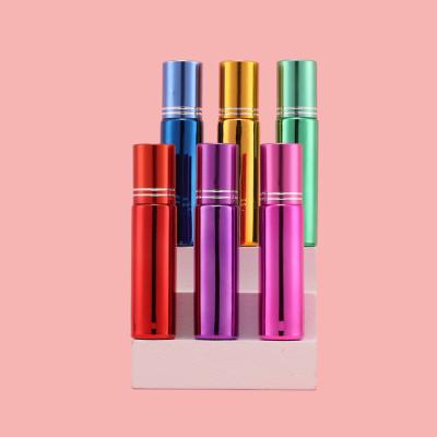 China Luxury cosmetic 3ml 6ml 10ml plate gold purple color essential oil roller glass bottles with stainless steel balls for sale