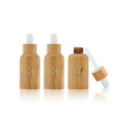 China Cosmetic Custom Bamboo Glass Package Bottle Essential Oil Dropper Bottle 30ml 50ml Essential Oil Glass Bottle for sale