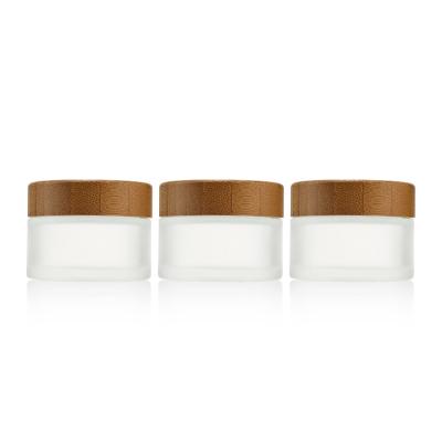 China 5g 15g 30g 50g 100g Round Body Skin Care Cosmetic Custom Eco Friendly Container Forsted White Cosmetic Cream Glass Jar Bamboo Lid for sale