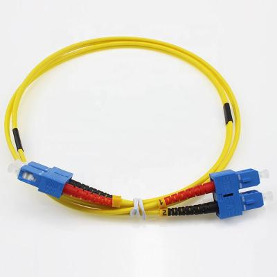 China FTTH FTTB FTTX network sc to sc fiber optic patchcord 2m sm dx patch cord yellow fiber patch cable for sale