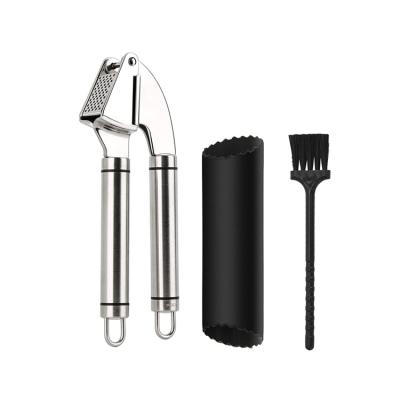 China Amazon Viable Hot Sale Garlic Press and Peeler Set Stainless Steel Meat Grinder and Silicone Tube Roller for sale