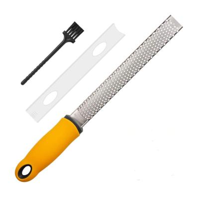 China Viable Yuming Factory 304 Stainless Steel Cheese Grater Lemon Zester Kitchen Cheese Tool With Plastic Handle for sale