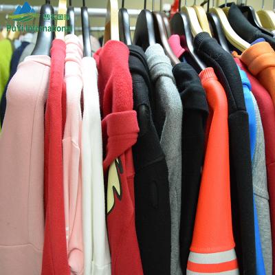 China 100% cotton used clothing wholesale used clothing 45kg balls sportswear second hand hoody clothes for sale for sale