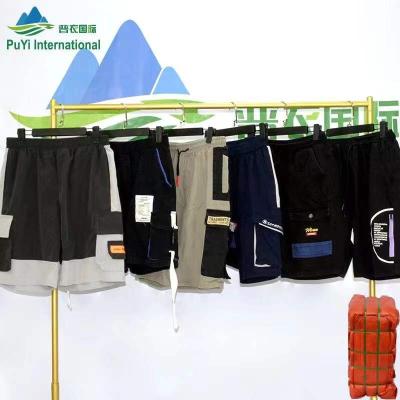 China Wholesale Used Cargo Bales 100Kg UK Polyester / Cotton Mens Clothing Second Hand Short Trousers for sale