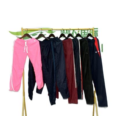 China PUYI 2022 high quality wholesale hot sale nylon tracksuit pants nylon used clothing balls for sale