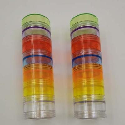 China Pill Containers Waterproof 7 Days Round Medicine Stackable Plastic Bottle Pill Weekly Pill Containers for sale