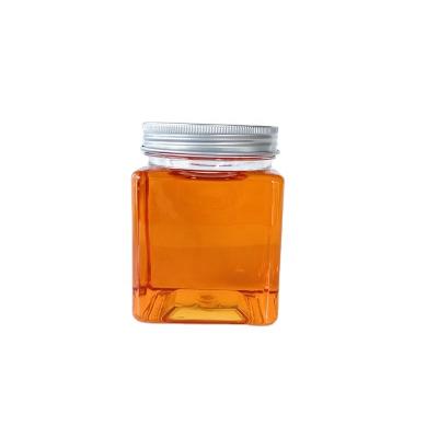 China Wholesale Food Honey Container 350ml Square Plastic Jar With Aluminum Lid for sale