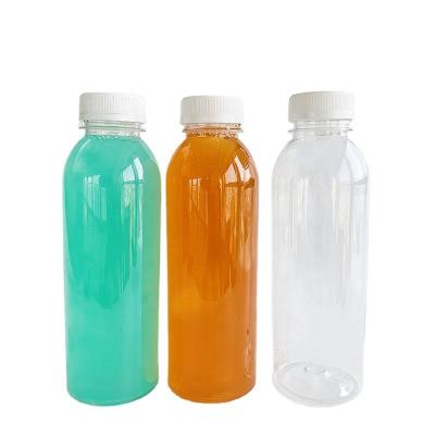 China Portable Disposable Beverage PET Drink Bottle , 450ml Clear Plastic Juice Bottle With Cap for sale