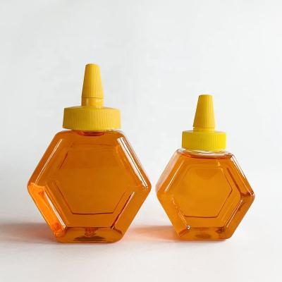 China Food Grade Honey Squeeze Bottle 500g Hexagon Plastic Plastic Squeeze Bottle for sale