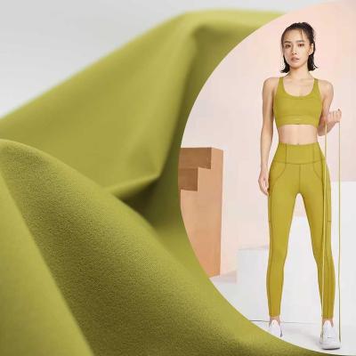 China Breathable Recycled Yoga Pants Sports Bras Fabric For Fitness Yoga Wear Warp Knitted Fabric For Yoga Leggings for sale