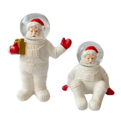 China Europe Astronauts Design Santa Claus Resin Snow Water Globe for sale