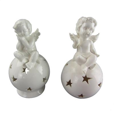 China Home Decoration White Hollow Out Ceramic Ball Christmas Angel With Led Light for sale