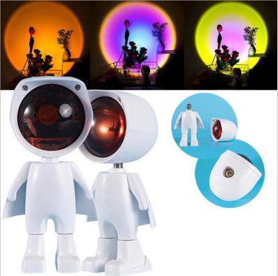 China New Arrival Modern Hot Selling Dim Robot Adjustable Sunset Night Light Projector for sale