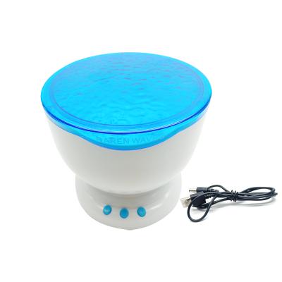 China Modern 12 Colors Night Light Projector Surf Lucky Stone Projection Lamp for sale