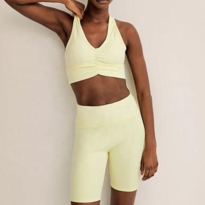 China Breathable custom made yellow fashion shorts yoga suit sleeveless top text line hot sale modification ladies clothing tight sportswear for sale