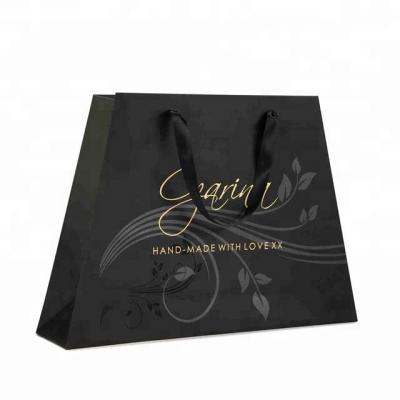 China Manufacturer Recyclable Custom Luxury Large Clothing Bag Gift Paper Shopping Bag for sale