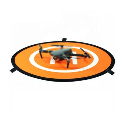 China Universal Waterproof Dual Side Quadcopter Drone Vertical Landing Pad Helipad Universal Fit for sale