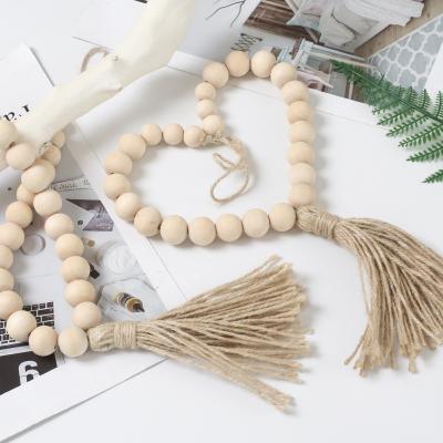 China Amazon Multifunctional Hot-selling Curtain Ties Handmade Cotton Woven Tassel Loop INS Beaded Curtain Wooden Straps for sale