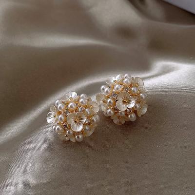 China New Korean Trendy Fashion Korean Simple Soft Round Earrings Small Petal Pearl Earrings Female Jewelry for sale