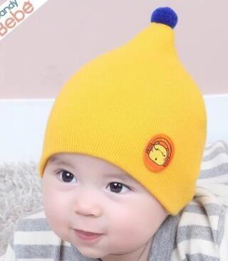 China Baby hat round mark animals candy color small hair ball children nipple hat warm knit hat wholesale for sale