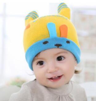 China Baby hat childrens cartoon headgear Korean best selling bunny curling knitted hat autumn and winter new wholesale for sale