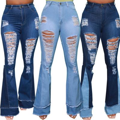 China Breathable hot sale fashion stitching elastic bell bottom woman jeans ripped jeans for women women jeans for sale