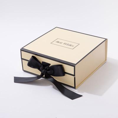 China Recycled Rigid Magnet Closure Bow Tie Folding Gift Paper Packaging Box With Black Ribbon Tie End for sale