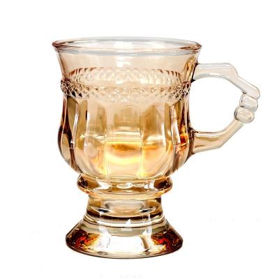 China Stocked Modern French Vintage Vintage Clear Amber Embossed Crystal Wedding Glass Mug Wine Cup Simple Water Juice With Handle for sale