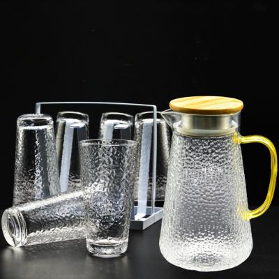 China Viable Hammer Style Hot Home Glass Cold Water Bottle with Bamboo and Wood Lid and Handle Glass Pitcher Set for sale