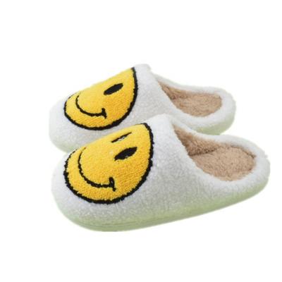 China Hottest Fashion Trend Christmas Fuzzy Fleece Shoes Smile Face Green Red Indoor Holiday Teddy Women Slippers for sale