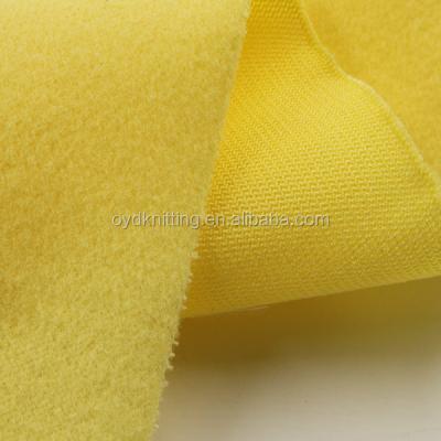 China 100% Polyester Shrink-Resistant Yellow Color 120gsm Color Lightly Shrink-Resistant One Side Brushed Knit Fabric for sale