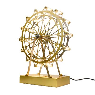 China New design modern special ferris wheel hotel creative home lamps decorations modern table desk lamp for sale