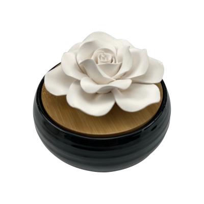 China Europe Home Decoration Black Round Flower Ceramic Aromatherapy Diffuser For Essential Oil for sale