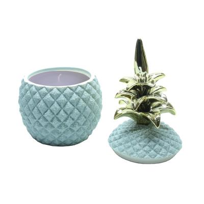 China Home Wholesale Pineapple Sand Decoration Ceramic Candle Jar Chandelier With Gold Lid Bulk for sale