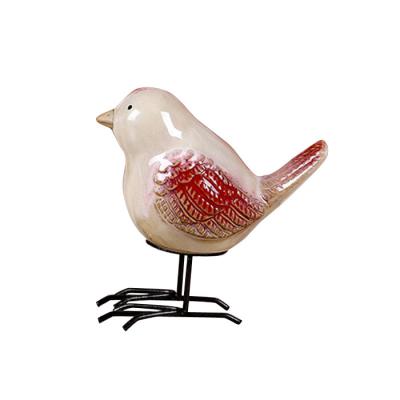 China Europe Indoor and Outdoor Decorative Hand Painted Shiny Glaze Small Glaze Ceramic Bird Figurines with Black Metal Feet for sale