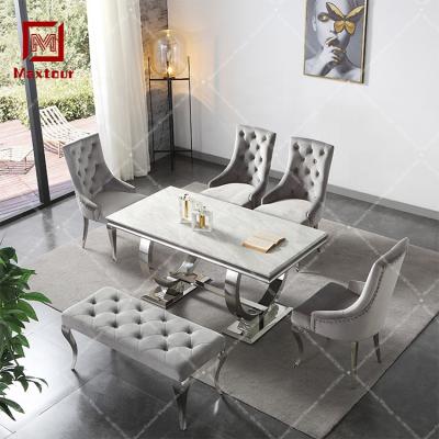 China (Other)Adjustable Marble Dining Table Sets Luxury Stainless Steel Dining Table Sets 6 Chairs for sale