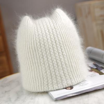 China Lovely COMMON warm winter knitted hats for women Angola rabbit fur beanie soft warm casual hats for lady hood Gorros de glris for sale