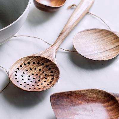 China 2022 Hot Sustainable And New Acacia Wood Kitchen And Dining Strainer Wooden Spoon for sale