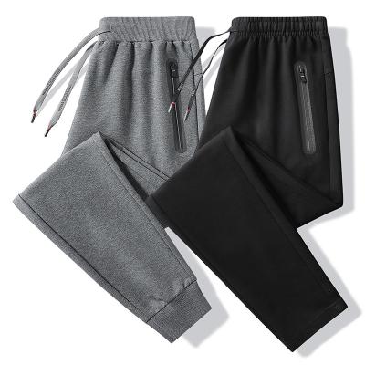 China Anti-wrinkle sports pants elastic men's jogger pants men's pants large size straight casual pants cotton solid color men's sweatpants for sale