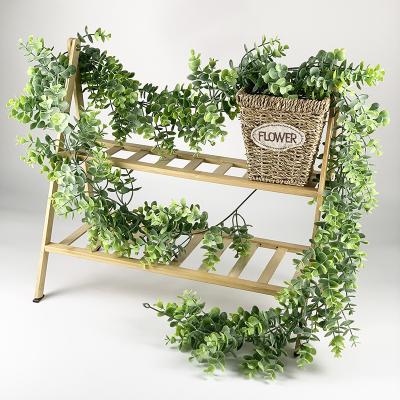 China Modern Hot Sale Odorless Climbers Vines Ivy Artificial Green Leaves Garden Decoration Wedding Decoration Wisteria Flowers for sale