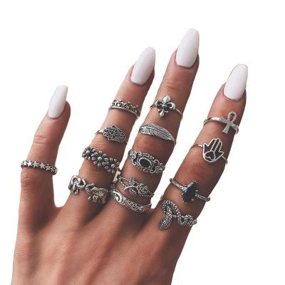 China 2023 NEW CLASSIC Accessories 15 Pieces Set Ring Personality Tide Lotus Sunflower Style Hollowed Out Geometric Black Gem Set Ring for sale