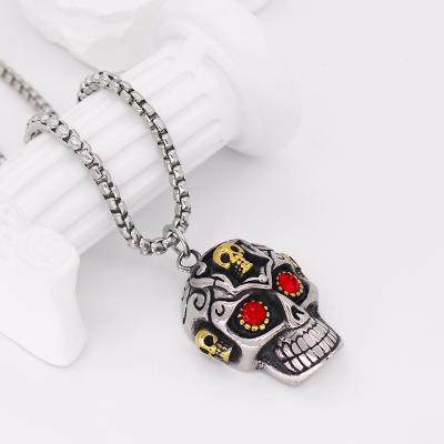 China Europe and America 2023 Personalized Scary Blue Crystal Head Skull Necklace Vampire Necklace Halloween Pendant Men Stainless Steel Jewelry for sale