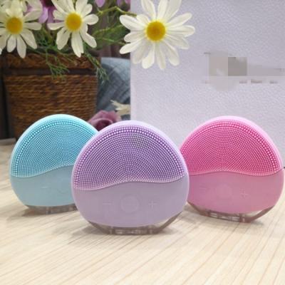 China Ultrasonic Acne Treatment Face Pore Remover Rotating Waterproof Electric Silicone Facial Cleansing Brush for sale