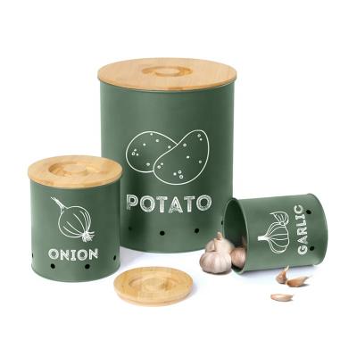 China Freshness Keeping Round Metal Potato Onion Garlic Sets Storage Container Can Potato Canister For Kitchen With Bamboo Lid for sale