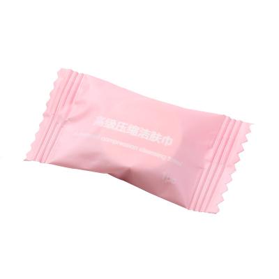 China Portable Pure Cotton Compressed Candy Compressed Clean Face Towel Hotel Compressed Face Towel for sale