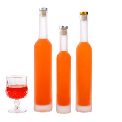 China Tall And Slim Clear Cork Top Beverage Free Sample Gin Ice Wine Glass Bottle 375ml 500ml 750ml for sale