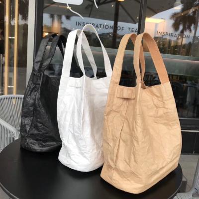 China Waterproof Washable Vintage Tote Bags Kraft Paper Handbags Eco - Friendly Shopping Bag for sale