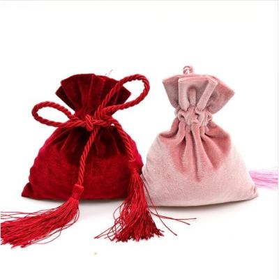 China Promotional velvet drawstring bags with tassel colorful velvet drawstring bag for packaging custom velvet pouch for storage for sale