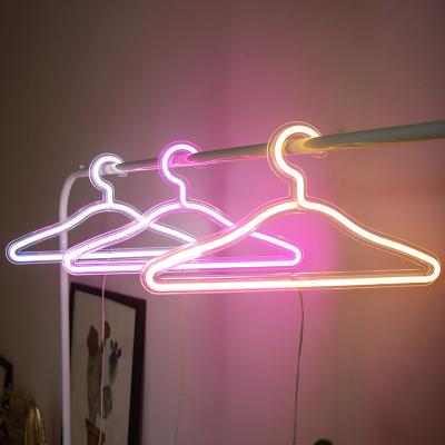 China Buildings Jump Selling Perfect Gift and Home Decor 4.5v USB Neon Hanger Clothes Rack Design Neon Signs for sale